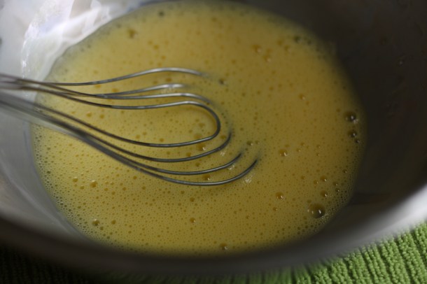 Whisk egg yolks